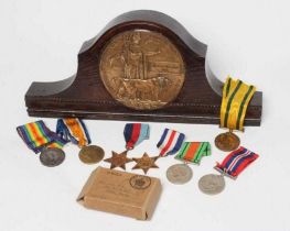 THE MEDALS AND DEATH PLAQUE OF THREE BROTHERS, comprising a Territorial War Medal and death plaque