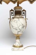 A CONTINENTAL WHITE MARBLE AND ORMOLU MOUNTED TABLE LAMP, early 20th century, of urn form with