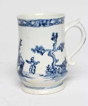 A VAUXHALL PORCELAIN MUG, 1755-60, of baluster form painted in underglaze blue with a small child