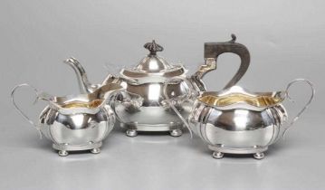 A SILVER THREE PIECE TEA SERVICE, maker Joseph Gloster Ld., Birmingham 1922, of lobed oval