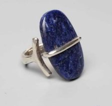 A GEORG JENSEN SILVER DRESS RING designed by Viviana Torun Bulow-Hube with a polished hardstone (