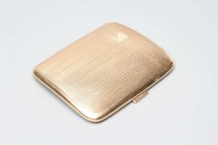 A 9CT GOLD CIGARETTE CASE of plain slightly concave rounded oblong form, with engine turned
