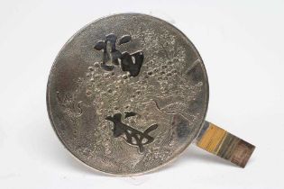 A JAPANESE PLATED ON COPPER HAND MIRROR, Meiji period, the circular plate cast in low relief with