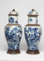 A PAIR OF CHINESE CRACKLE GLAZE VASES AND COVERS of inverted baluster form painted in underglaze