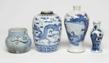 THREE CHINESE PORCELAIN VASES, comprising a small pale blue glazed squat baluster vase with a