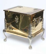 A LACQUERED BRASS COAL BOX, early 20th century, of oblong form with silvered metal mounts and
