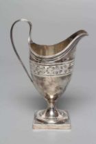 A LATE GEORGE III SILVER HELMET MILK JUG, maker Soloman Hougham, London 1795, with reeded loop