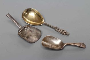 A LATE GEORGE III SILVER CADDY SPOON, maker's mark IT, Birmingham 1802, the shovel bowl engraved