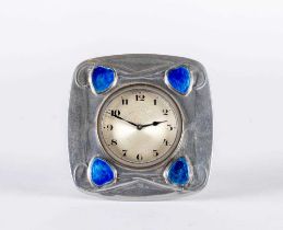 ARCHIBALD KNOX FOR LIBERTY - A TUDRIC PEWTER CASED TIMEPIECE of rounded square form, each angle with
