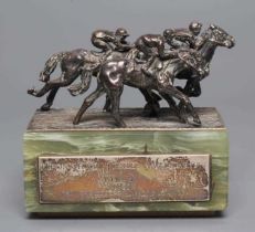 A SILVER HORSE RACING TROPHY, maker Hector Miller, London 1977, cast as three galloping horses