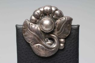 A GEORG JENSEN SILVER BROOCH cast as a stylised flower with three leaves, stamped and numbered 71 (