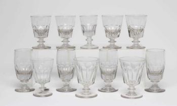 A MATCHED SET OF SEVEN GLASS RUMMERS with panel cut bucket bowls, together with a set of four