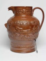 A LARGE SALTGLAZE STONEWARE HARVEST JUG, mid 19th century, of baluster form with hand support