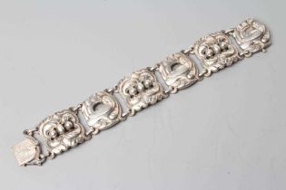 A GEORG JENSEN SILVER BRACELET designed by Jensen with shaped links cast and pierced with doves