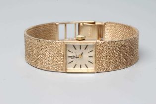 A LADY'S 9CT GOLD TISSOT WRISTWATCH, the square champagne dial with applied metal batons, the