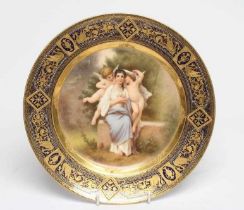 A VIENNA PORCELAIN CABINET PLATE centrally painted in polychrome enamels by Ens with 'L'eveil du