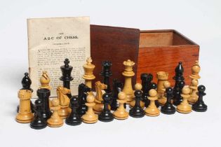 A BOX AND EBONY STAUNTON PATTERN CHESS SET, unmarked, king 3 1/4" high, with Jaques ABC of Chess