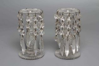 A SMALL PAIR OF REGENCY GLASS LUSTRES, the slice cut everted rims hung with faceted drops with spire