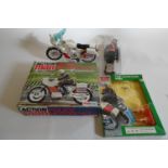 Action Man police motorcyclist and opened police motorcyclist outfit box (police signs still in