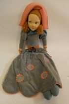 Lenci style pyjama case doll, with felt head, painted features, felt pink hat, velvet blue dress,