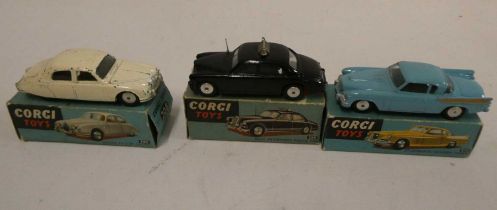 Corgi 211 Studebaker Hawk, 209 Riley police car and 208 Jaguar saloon, boxes fair to poor, models