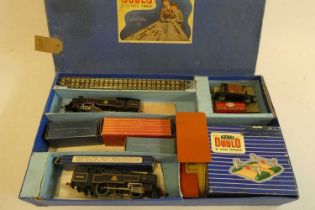 Hornby Dublo 2-6-4 tank locomotives, five goods trucks, signal box and level crossing, some items