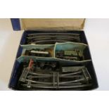 Playworn Hornby clockwork train set with Type 101 LNER locomotive and three good wagons, poor