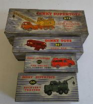 Four boxed Dinky vehicles comprising 981 Horsebox, 955 Fire engine, 661 Recovery tractor and 972