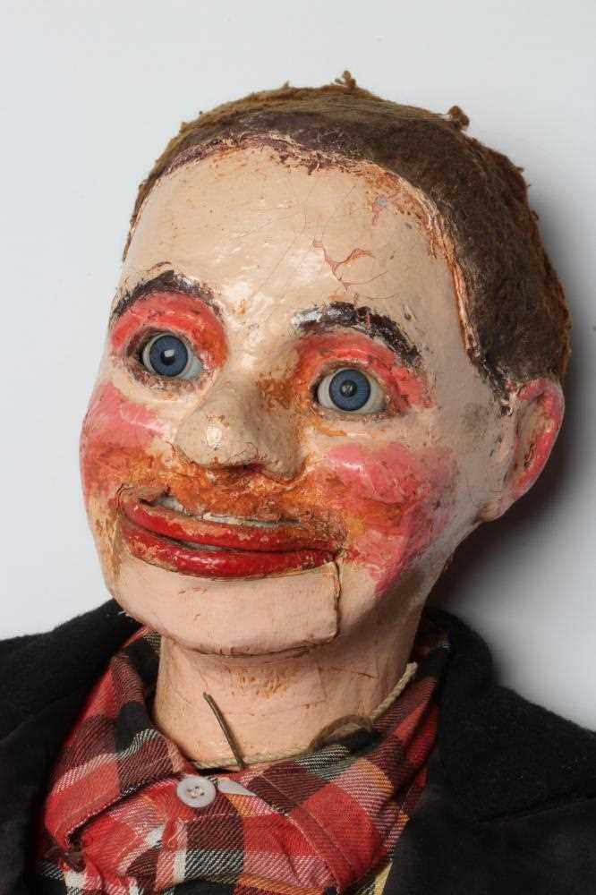 A ventriloquist dummy, circa 1930s, the papier mache head with blue glass eyes with sideways - Image 2 of 7