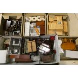 Five boxes of dolls house furniture and accessories, including wood furniture, upholstered suites