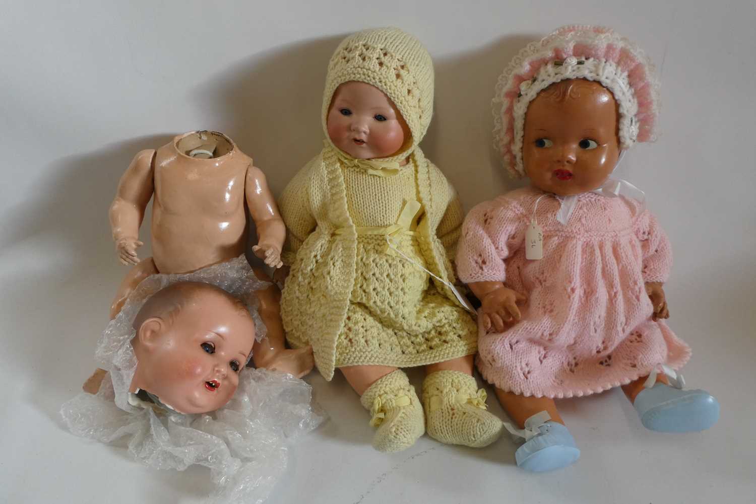 Three vintage dolls, comprising an 18" Armand Marseille 351/4k baby doll with sleeping eyes, another