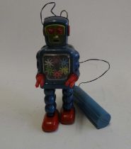 Yoshiya (KO) Japan battery operated walking robot with coloured gearing to body, unable to verify