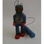 Yoshiya (KO) Japan battery operated walking robot with coloured gearing to body, unable to verify