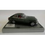 Heritage Motor Centre 1:18th scale model MGC GT 1969 finished in British Racing green, very dusty