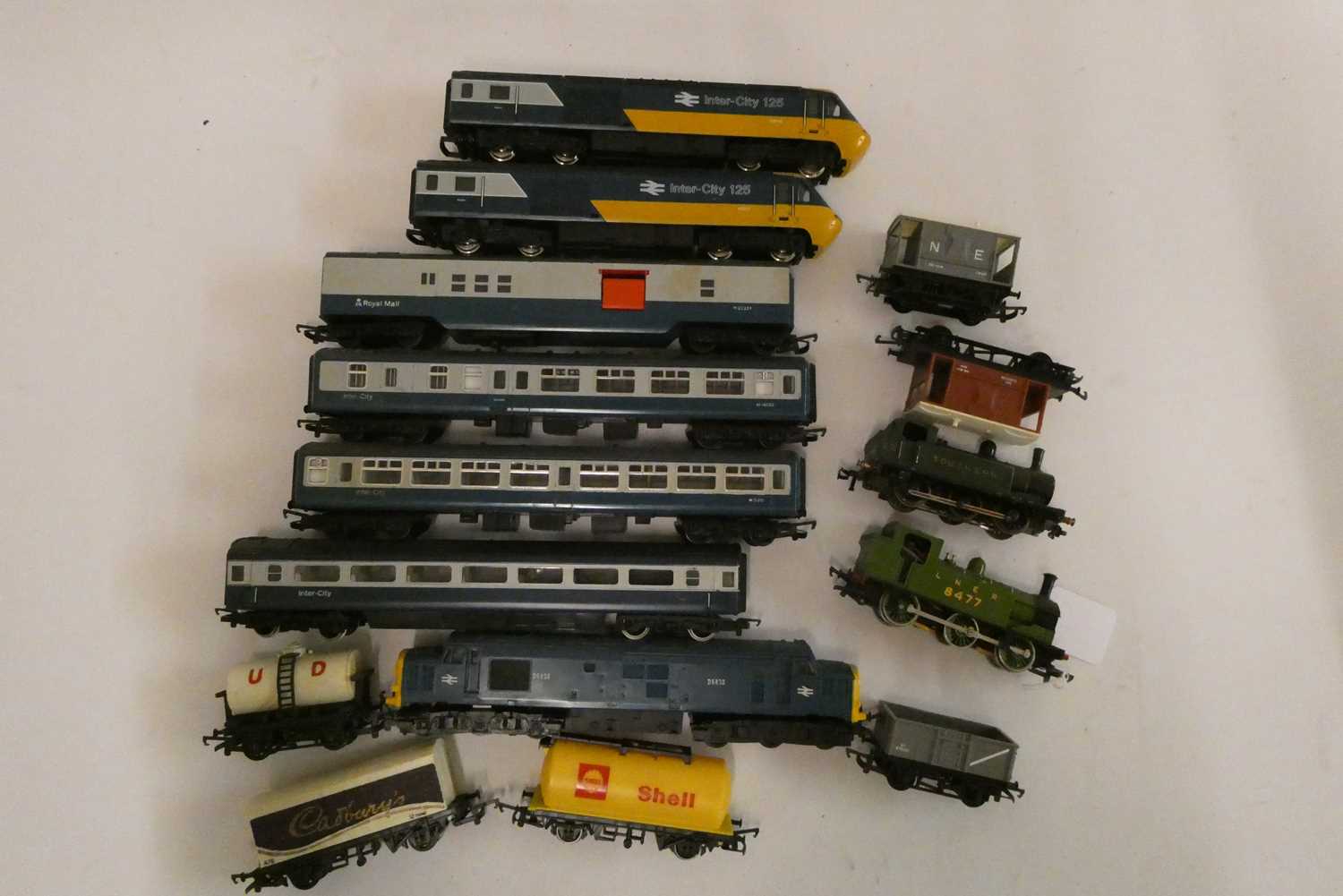 Playworn trains by Hornby and others including two tank locomotives, Intercity 125 coaches and goods