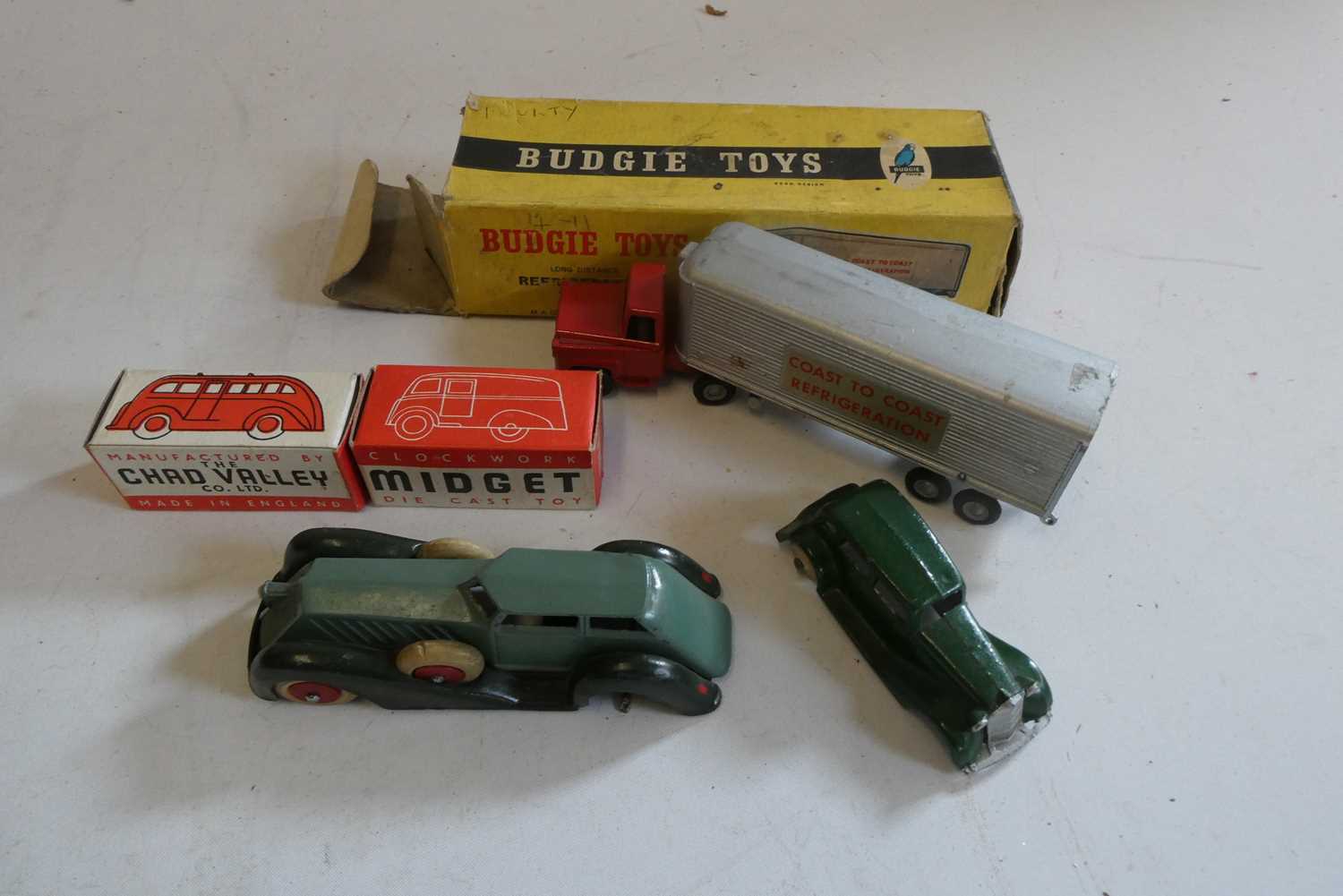 Two Chad Valley diecast clockwork vans, some paint loss, both items boxed, fair Buddy Toys