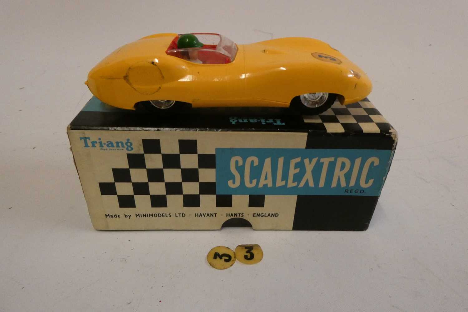 Early Scalextric Lister Jaguar Race car in yellow, boxed, good +