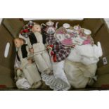 A box of dolls, clothing and accessories, including a pair of vintage composition head boys, a