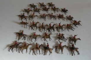 Large quantity of 55mm solid cast Hunt and Polo riders on horseback, most items have damage or paint