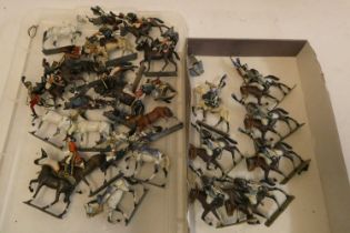 Twenty two Napoleonic mounted soldiers of unknown make, solid cast figures, 80 millimetres,