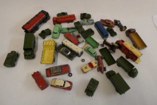 Playworn Dinky vehicles including cars, trucks, army vehicles and race cars, most items have paint