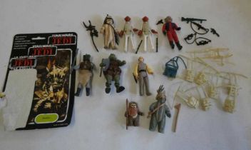 9 Star Wars figures and accessories, comprising Lobot, Teebo with card, Wicket, Logray, 2 Admiral