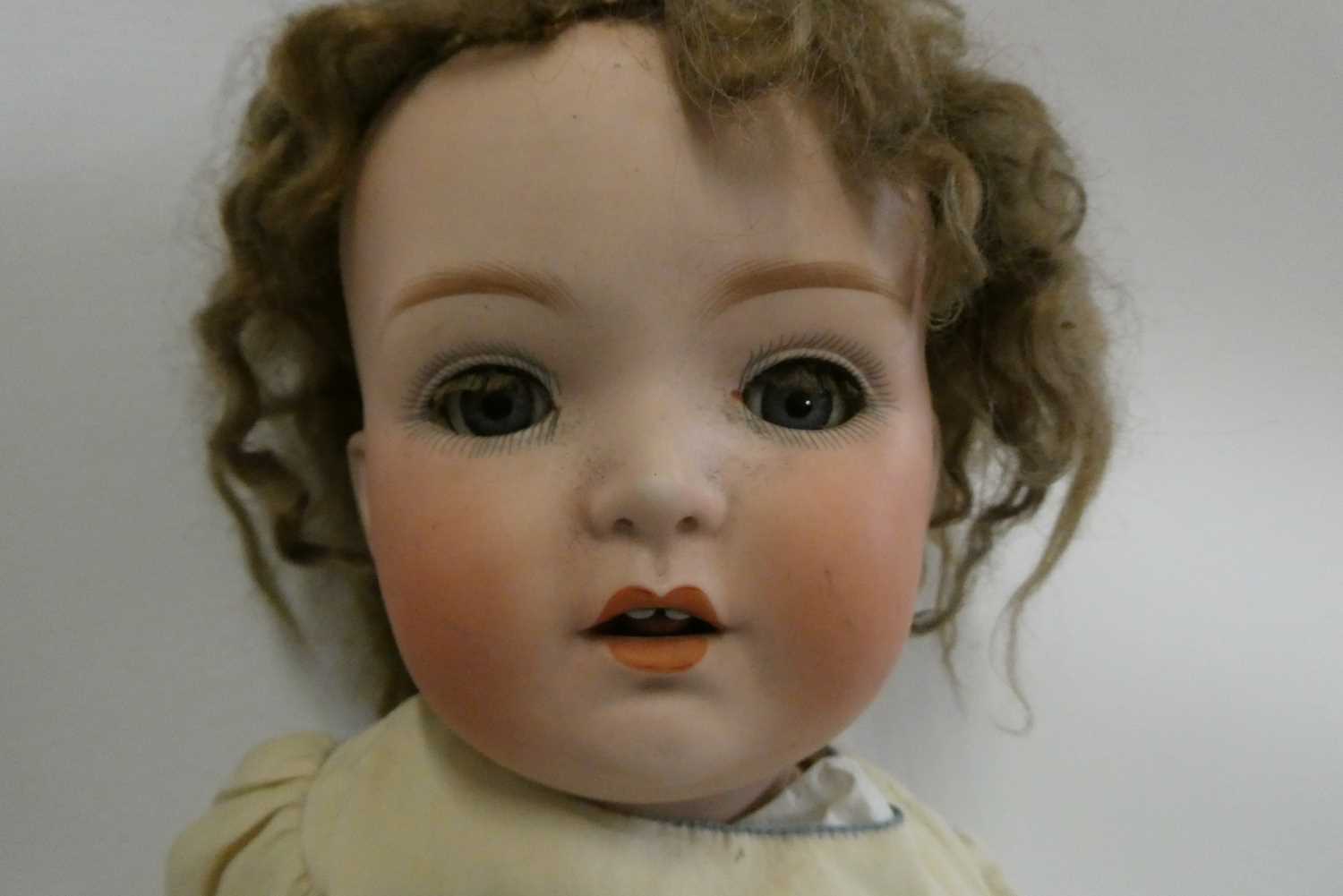 A Heubach bisque socket head doll, with blue glass sleeping eyes, open mouth, teeth, tongue, bent - Image 2 of 5