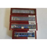 Four Bemo HOm Arosu Express coaches in blue with flower motif, boxed, excellent