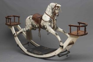 A G & J Lines rocking horse, late 19th century, of carved wood construction painted in dappled grey,