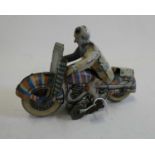 Mettoy clockwork clown motorcycle, tinplate finish has sunlight fading and some minor damage,