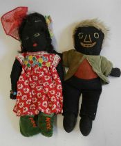Two folk art vintage dolls, one with painted features, the other sewn, both in original clothing,