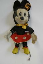 Merrythought Minnie Mouse, with fabric face, plush body, felt clothing and maker's label to foot,