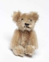 Possibly Farnell miniature soldier bear, with yellow plush, black button eyes and sewn nose, 2 3/