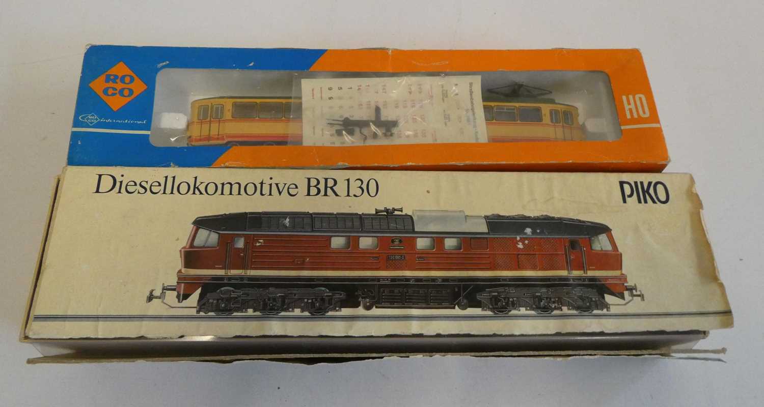 Piko D.R. BR130 diesel locomotive and RoCo two car tram, both items boxed, good